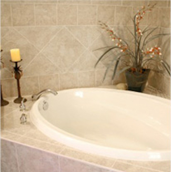 Inspiration for a small contemporary ensuite bathroom in Minneapolis with tiled worktops and beige tiles.