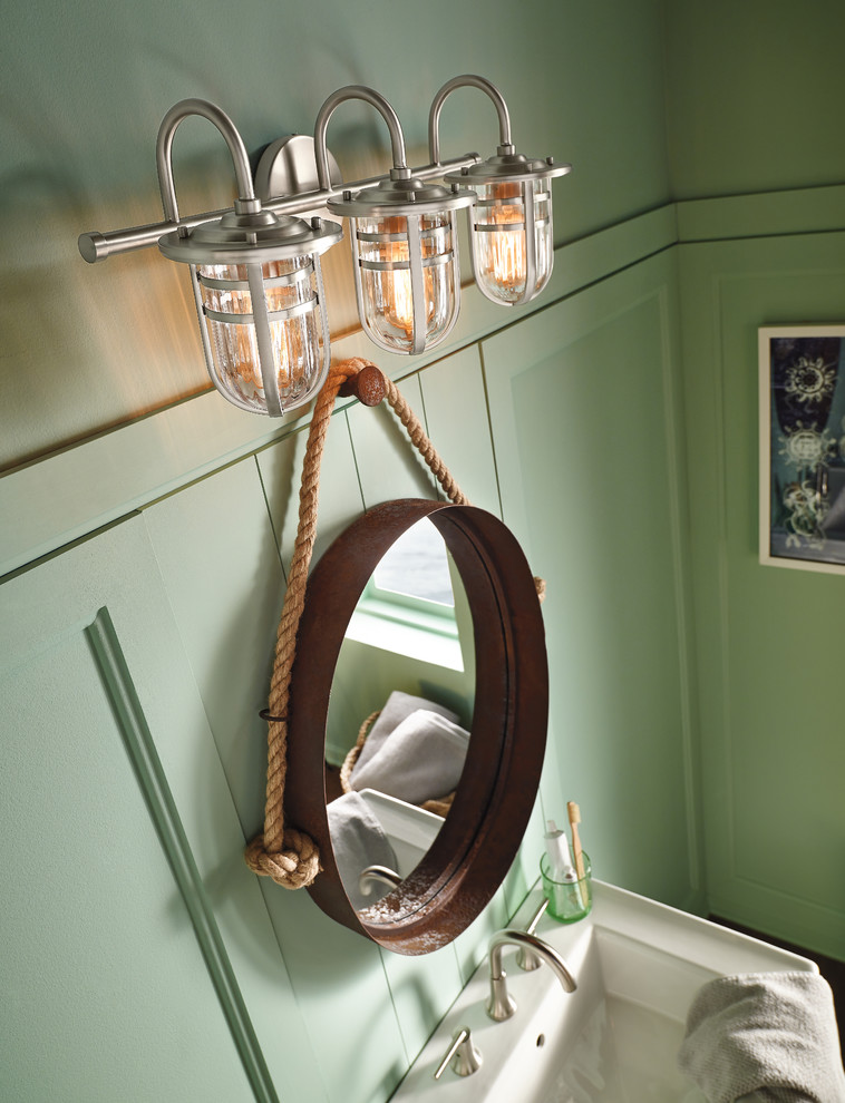 Immagine di una stanza da bagno stile marino di medie dimensioni con pareti verdi e lavabo a colonna