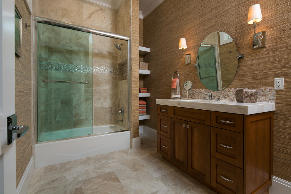 Example of a large island style master stone tile slate floor bathroom design in Miami with shaker cabinets, white cabinets, brown walls, an undermount sink and marble countertops