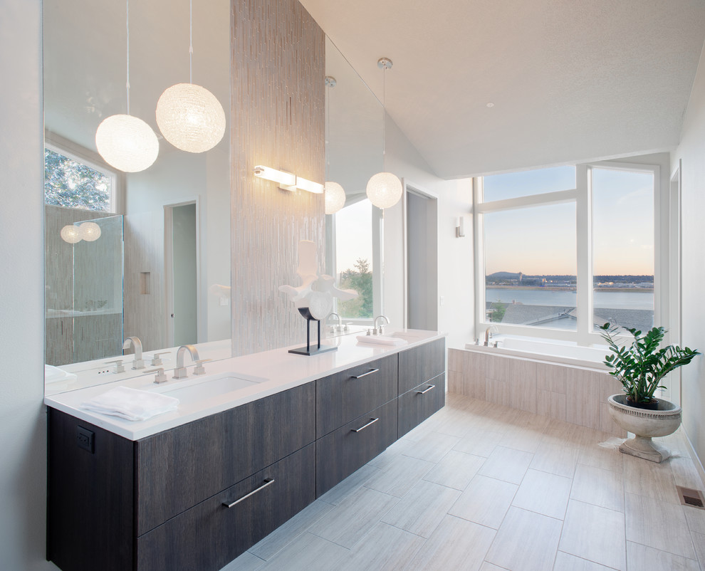 This is an example of a contemporary bathroom in Portland with matchstick tiles, a submerged sink and white tiles.