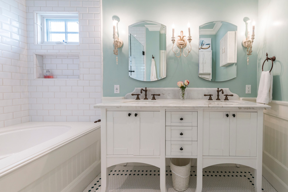 Mid-sized beach style 3/4 white tile and subway tile mosaic tile floor and white floor bathroom photo in Los Angeles with furniture-like cabinets, white cabinets, green walls, an undermount sink, marble countertops and white countertops