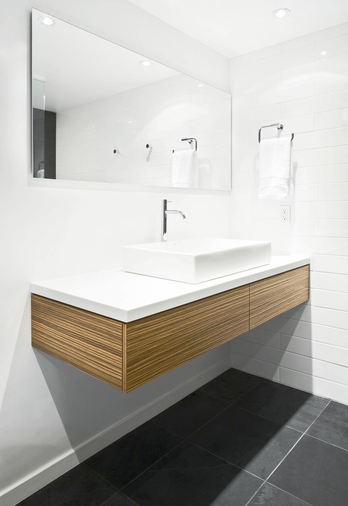 Inspiration for a modern bathroom in Vancouver with a vessel sink.