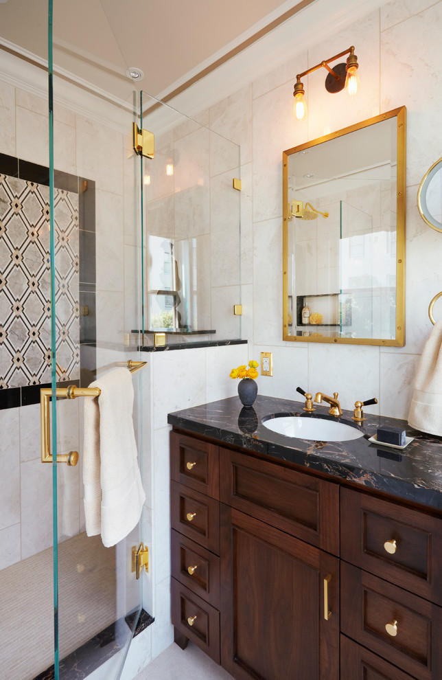 Design ideas for a medium sized traditional ensuite bathroom in San Francisco with freestanding cabinets, dark wood cabinets, a built-in shower, a one-piece toilet, beige tiles, marble tiles, beige walls, a built-in sink, marble worktops and a hinged door.