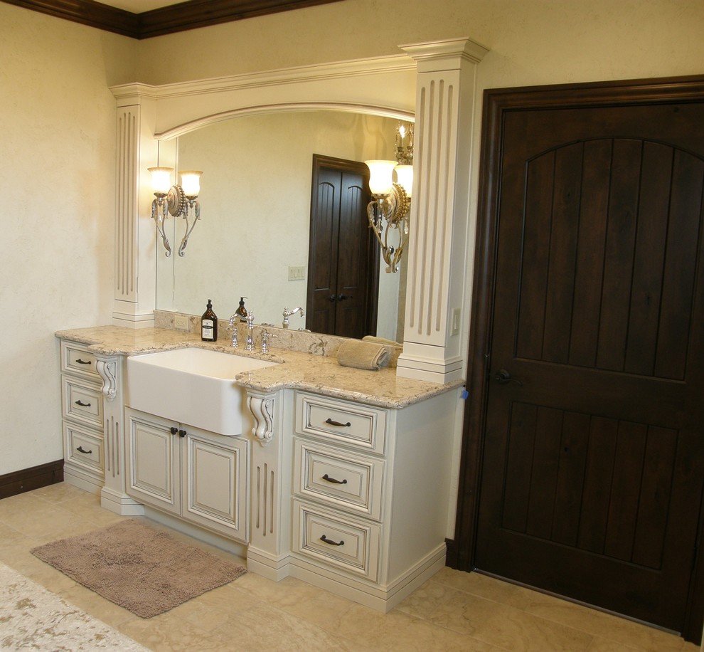 Photo of a small traditional ensuite bathroom in Denver with raised-panel cabinets, white cabinets, beige tiles, ceramic tiles, white walls, ceramic flooring, granite worktops, a built-in bath and an alcove shower.