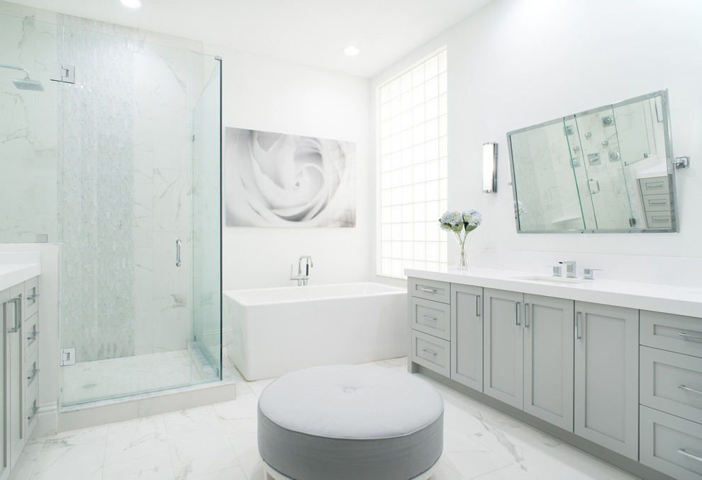 Bathroom - transitional bathroom idea in Miami with a hinged shower door