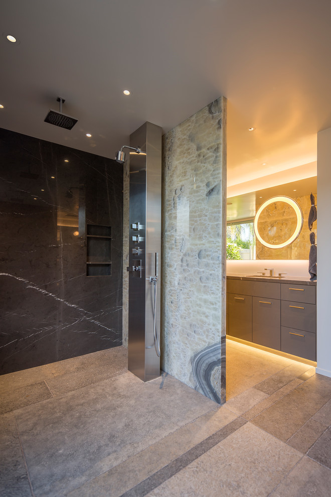 Inspiration for a large contemporary ensuite bathroom in DC Metro with flat-panel cabinets, grey cabinets, a built-in shower, a one-piece toilet, marble tiles, white walls, engineered stone worktops, grey floors, an open shower and grey worktops.