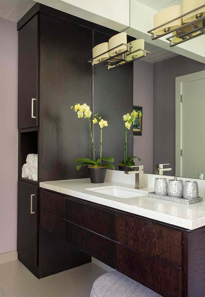 Inspiration for a mid-sized 1950s master white tile and porcelain tile porcelain tile bathroom remodel in San Francisco with flat-panel cabinets, dark wood cabinets, a one-piece toilet, purple walls, an undermount sink and quartz countertops