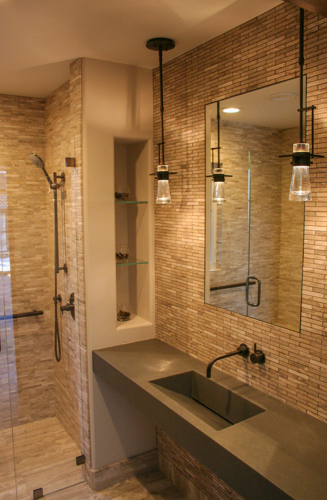 Inspiration for a medium sized traditional shower room bathroom in San Francisco with an integrated sink, concrete worktops, a built-in shower, a wall mounted toilet, beige tiles, stone tiles, limestone flooring and beige walls.