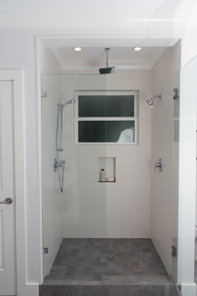 Photo of a large contemporary bathroom in San Francisco with white tiles, cement tiles and porcelain flooring.