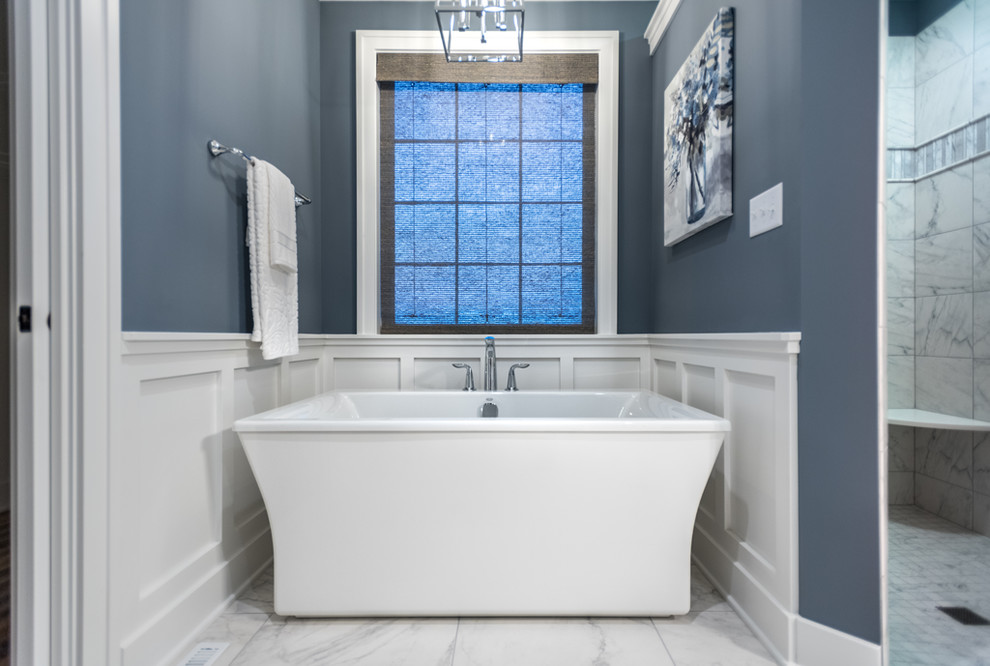 Photo of a medium sized traditional ensuite bathroom in Other with a freestanding bath, a built-in shower, blue walls, ceramic flooring, white floors and an open shower.