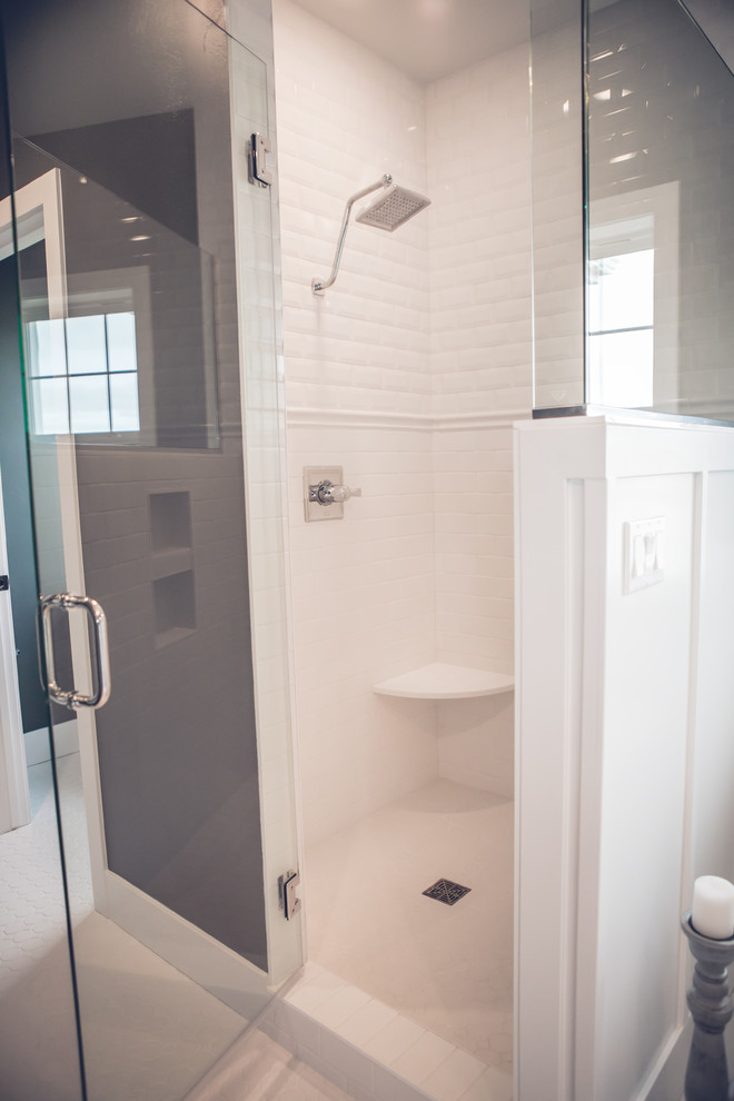Medium sized contemporary ensuite bathroom in Other with shaker cabinets, white cabinets, a freestanding bath, a corner shower, white tiles, metro tiles, grey walls, porcelain flooring, a submerged sink, engineered stone worktops, white floors and a hinged door.