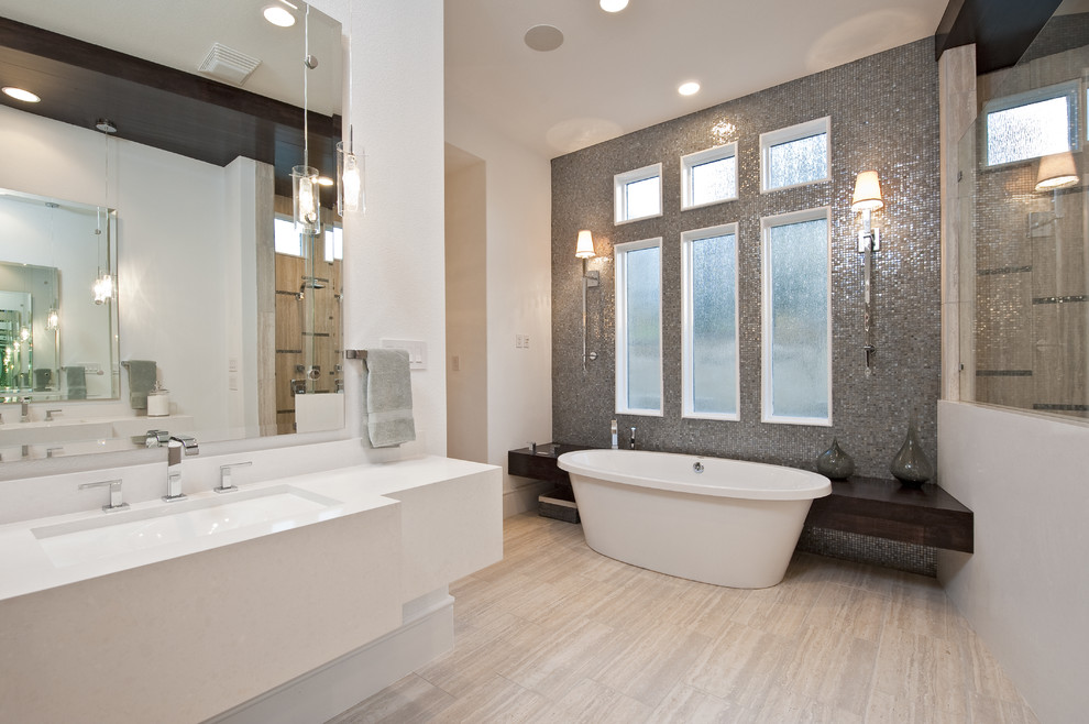 Example of a trendy mosaic tile freestanding bathtub design in Austin