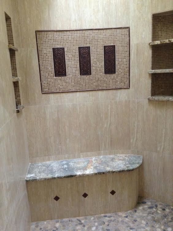 Alcove shower - transitional master beige tile, brown tile and mosaic tile pebble tile floor alcove shower idea in Albuquerque with beige walls