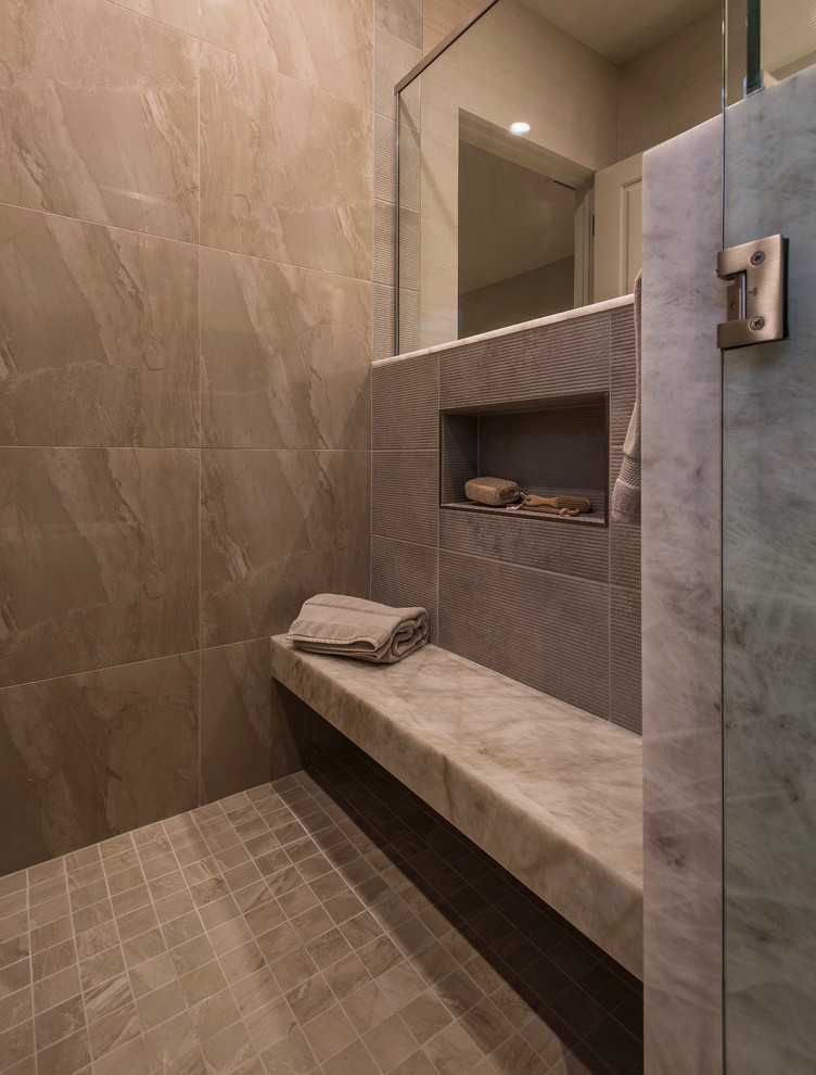 This is an example of a large contemporary ensuite bathroom in Phoenix with flat-panel cabinets, grey cabinets, a freestanding bath, a corner shower, a one-piece toilet, beige tiles, porcelain tiles, beige walls, porcelain flooring, a submerged sink, quartz worktops, beige floors, a hinged door and white worktops.