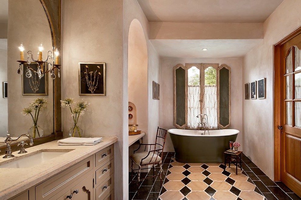 Bathroom in Phoenix with a submerged sink, recessed-panel cabinets, grey cabinets and a freestanding bath.