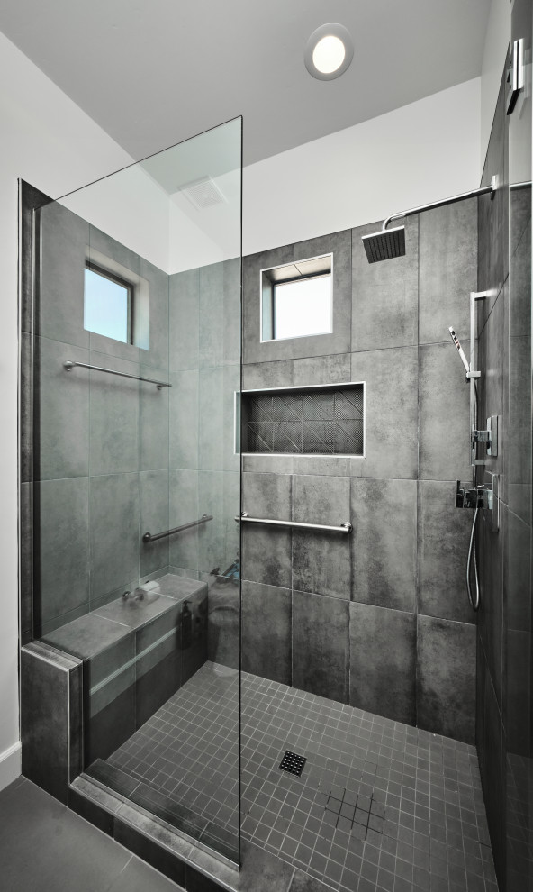 Inspiration for a medium sized contemporary family bathroom in Phoenix with flat-panel cabinets, brown cabinets, grey tiles, ceramic tiles, white walls, porcelain flooring, a submerged sink, engineered stone worktops, grey floors, an open shower, white worktops, a shower bench, a single sink and a floating vanity unit.