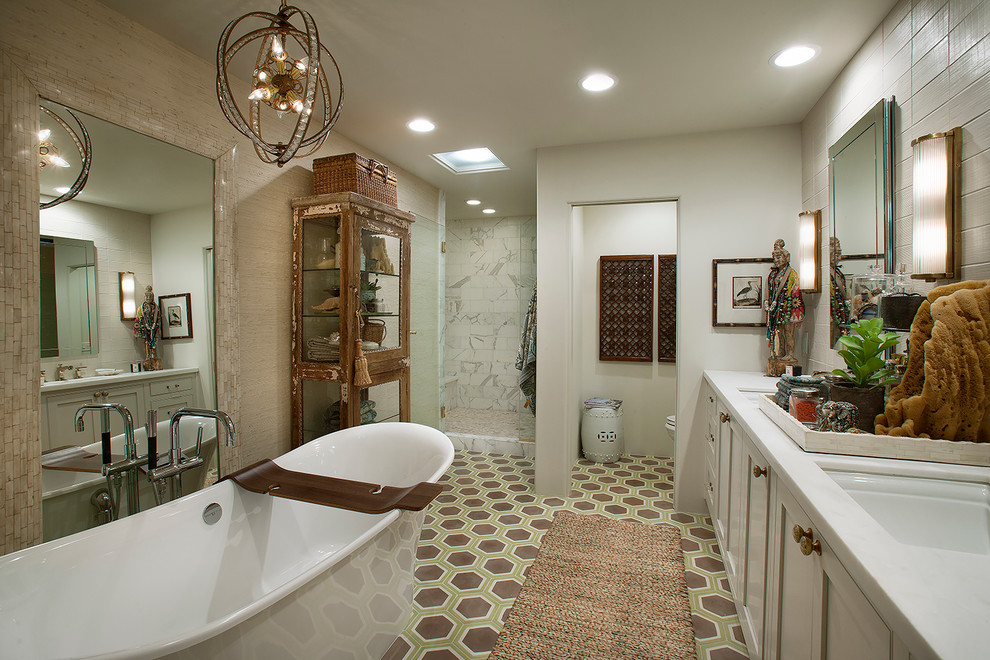 Bathroom - mid-sized eclectic master white tile and stone tile ceramic tile bathroom idea in Phoenix with an undermount sink, recessed-panel cabinets, white cabinets, a two-piece toilet and white walls