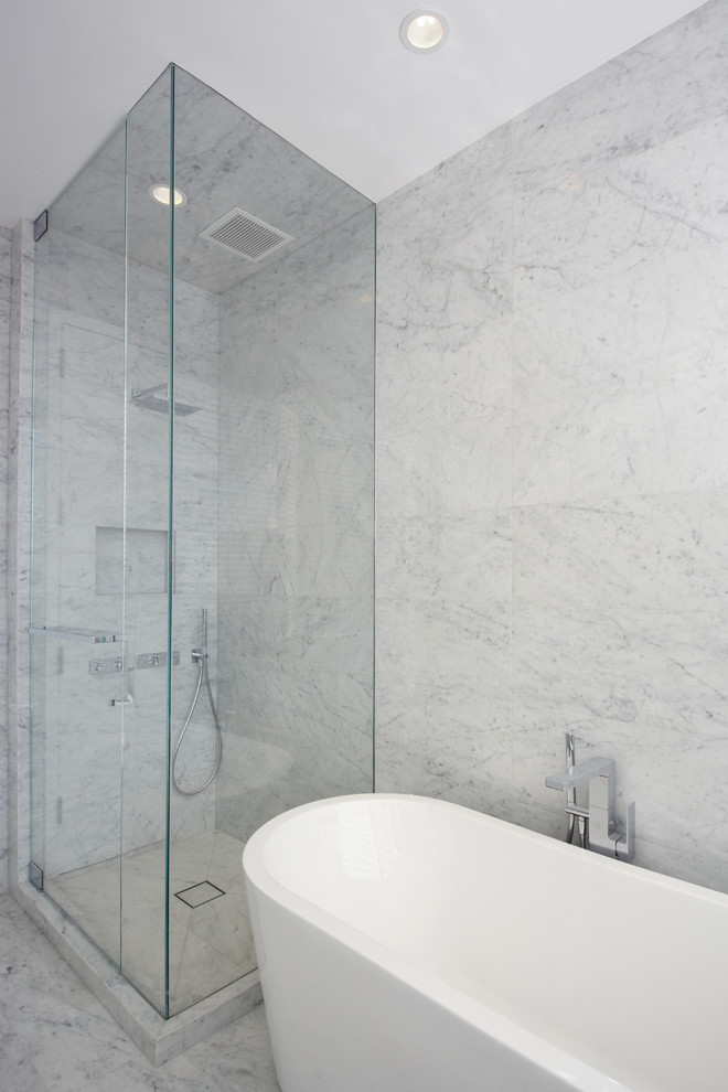 Example of a small minimalist master gray tile and stone tile marble floor bathroom design in New York with white cabinets, quartz countertops and an undermount sink