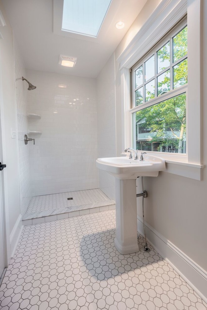 Mid-sized cottage white tile and subway tile mosaic tile floor and white floor bathroom photo in Other with a pedestal sink, gray walls and a two-piece toilet