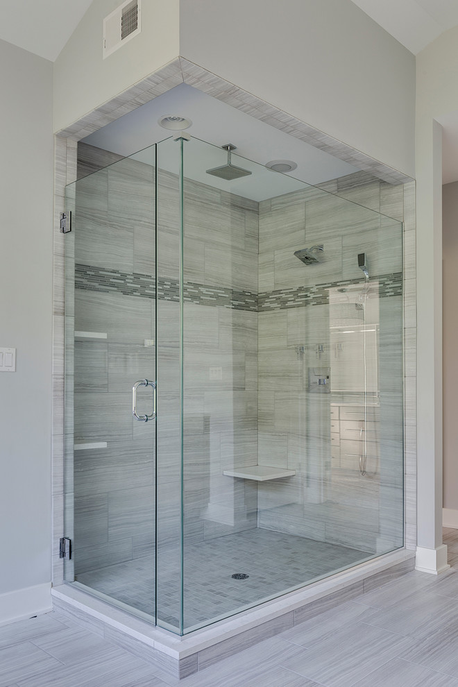 Example of a huge trendy master gray tile and ceramic tile ceramic tile bathroom design in Other with flat-panel cabinets, gray cabinets, gray walls, an undermount sink and quartzite countertops