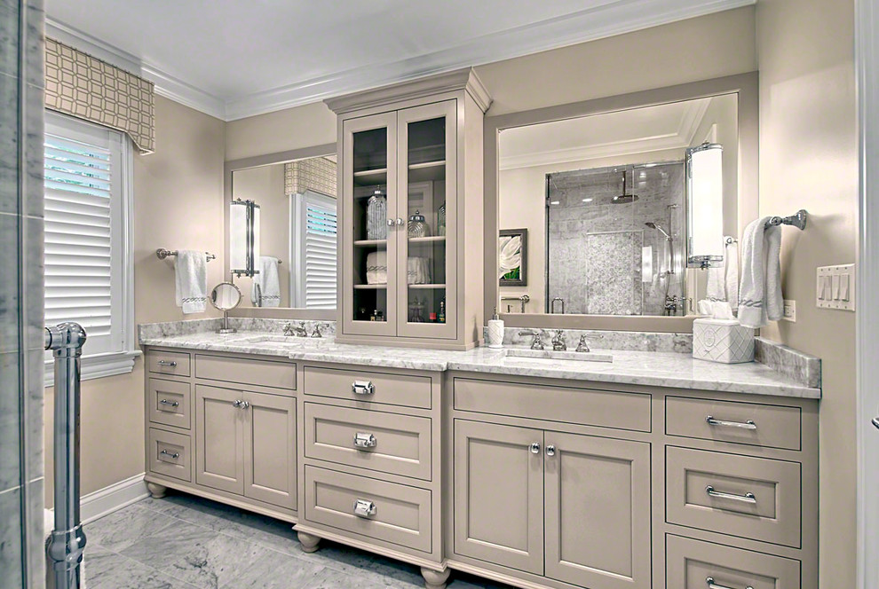 Example of a mid-sized classic master white tile and stone tile marble floor double shower design in Chicago with recessed-panel cabinets, gray cabinets, marble countertops, a one-piece toilet, an undermount sink and gray walls