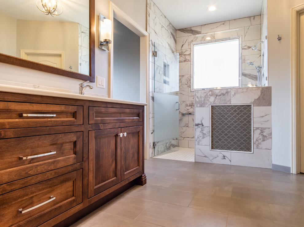 Design ideas for a large traditional ensuite bathroom in Kansas City with recessed-panel cabinets, dark wood cabinets, a built-in shower, a bidet, grey walls, ceramic flooring, a submerged sink, quartz worktops, grey floors and white worktops.