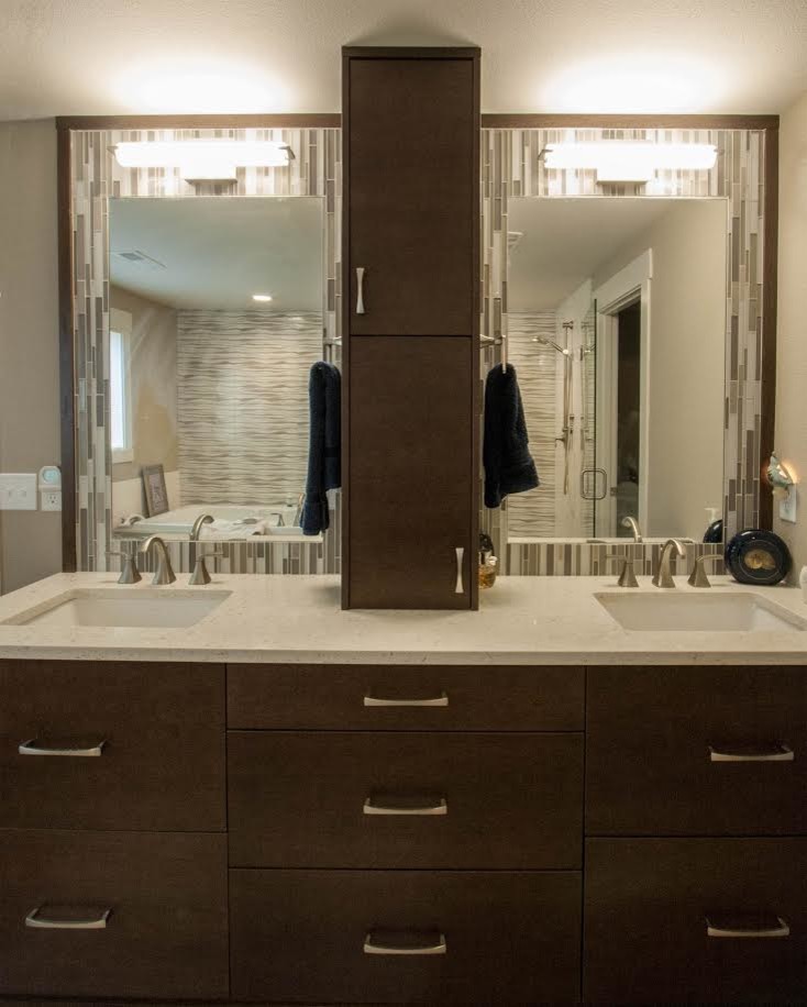 This is an example of a contemporary bathroom in Seattle with flat-panel cabinets, brown cabinets, light hardwood flooring and beige floors.
