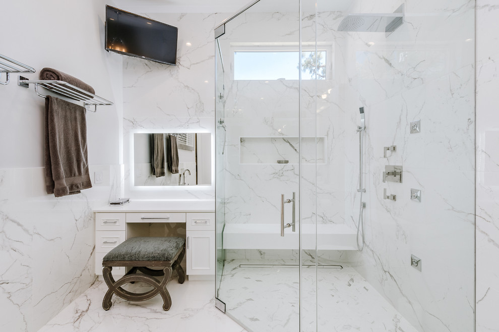 Inspiration for a large transitional master white tile and porcelain tile porcelain tile and white floor bathroom remodel in Los Angeles with shaker cabinets, white cabinets, white walls, an undermount sink, quartz countertops and white countertops