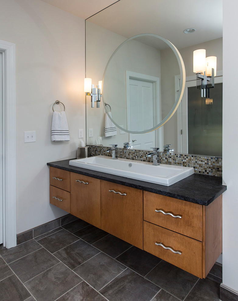 Bathroom - mid-sized contemporary master gray tile and porcelain tile porcelain tile bathroom idea in Richmond with a trough sink, flat-panel cabinets, medium tone wood cabinets, granite countertops and gray walls