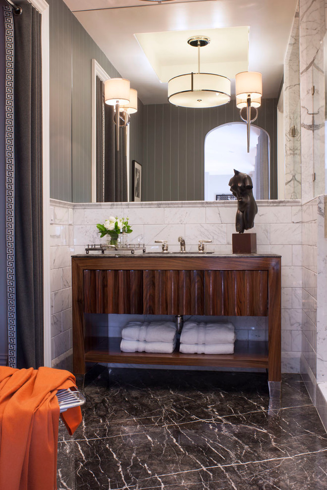 На фото: главная ванная комната среднего размера в стиле неоклассика (современная классика) с белой плиткой, врезной раковиной, темными деревянными фасадами, душем в нише, плиткой из листового камня, серыми стенами, мраморным полом и плоскими фасадами