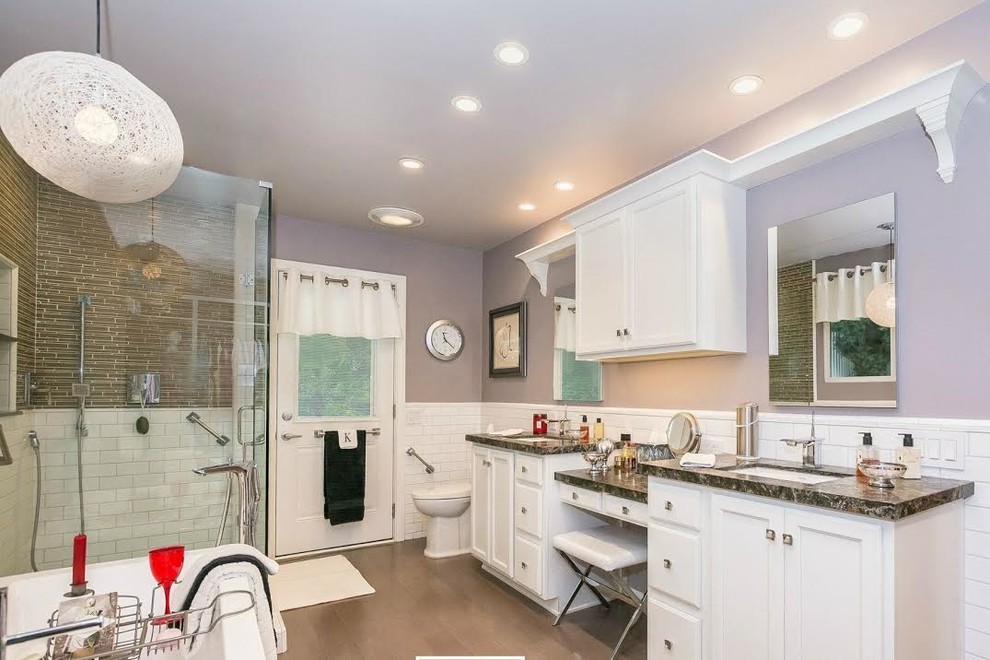 Mid-sized elegant master beige tile, brown tile and matchstick tile cement tile floor and brown floor bathroom photo in Orange County with shaker cabinets, white cabinets, a two-piece toilet, purple walls, an undermount sink, granite countertops and a hinged shower door