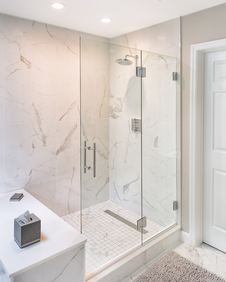 Large classic ensuite bathroom in New York with shaker cabinets, grey cabinets, a corner shower, a two-piece toilet, white tiles, ceramic tiles, grey walls, ceramic flooring, a submerged sink, engineered stone worktops, white floors, a hinged door and white worktops.
