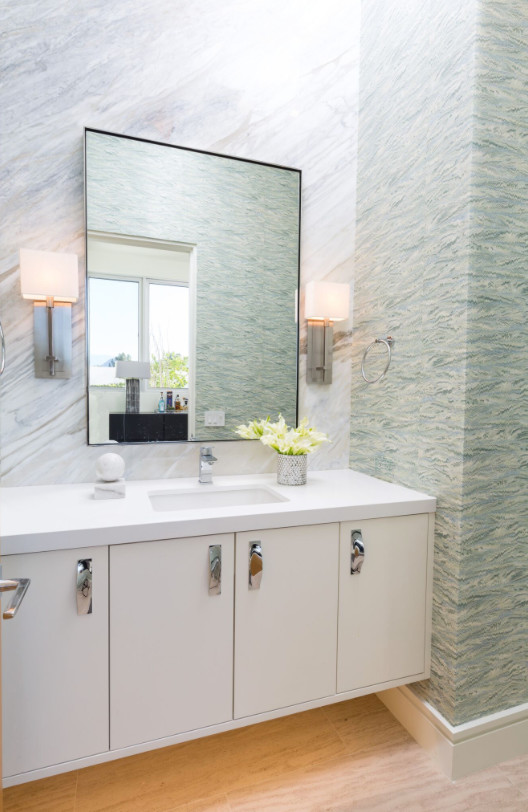 Example of a mid-sized minimalist 3/4 blue tile, gray tile, white tile and stone slab light wood floor bathroom design in Los Angeles with flat-panel cabinets, white cabinets, multicolored walls, an undermount sink and quartz countertops
