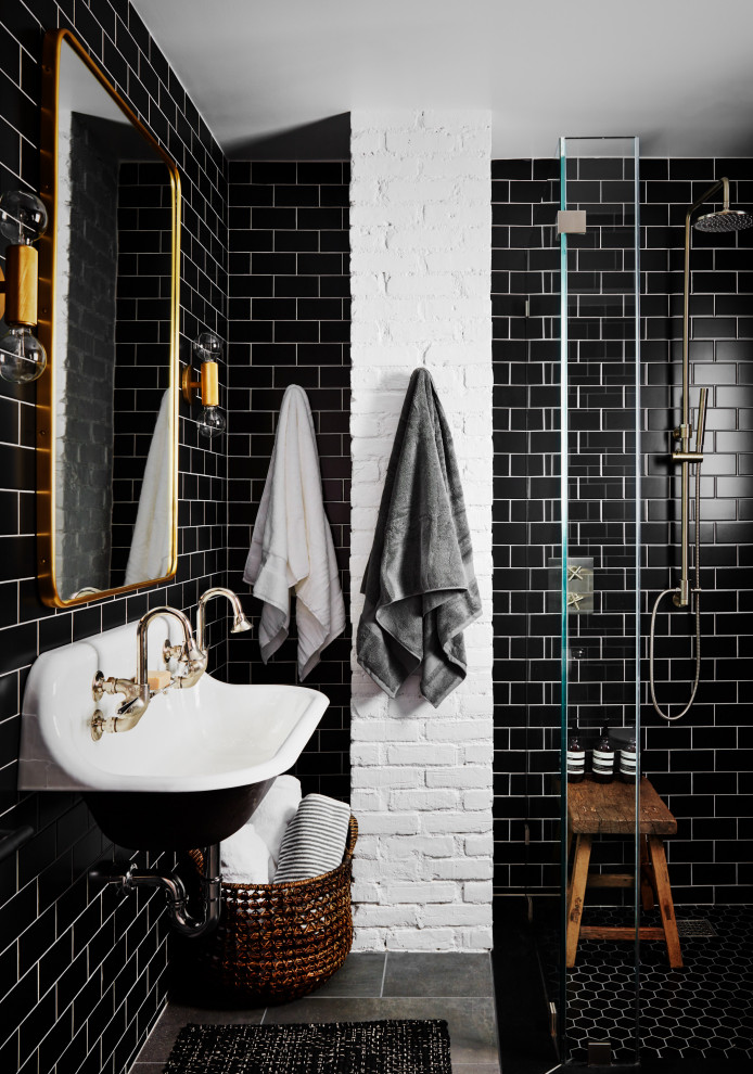 Example of a mid-sized cottage 3/4 black tile and subway tile porcelain tile and gray floor doorless shower design in New York with white walls and a wall-mount sink