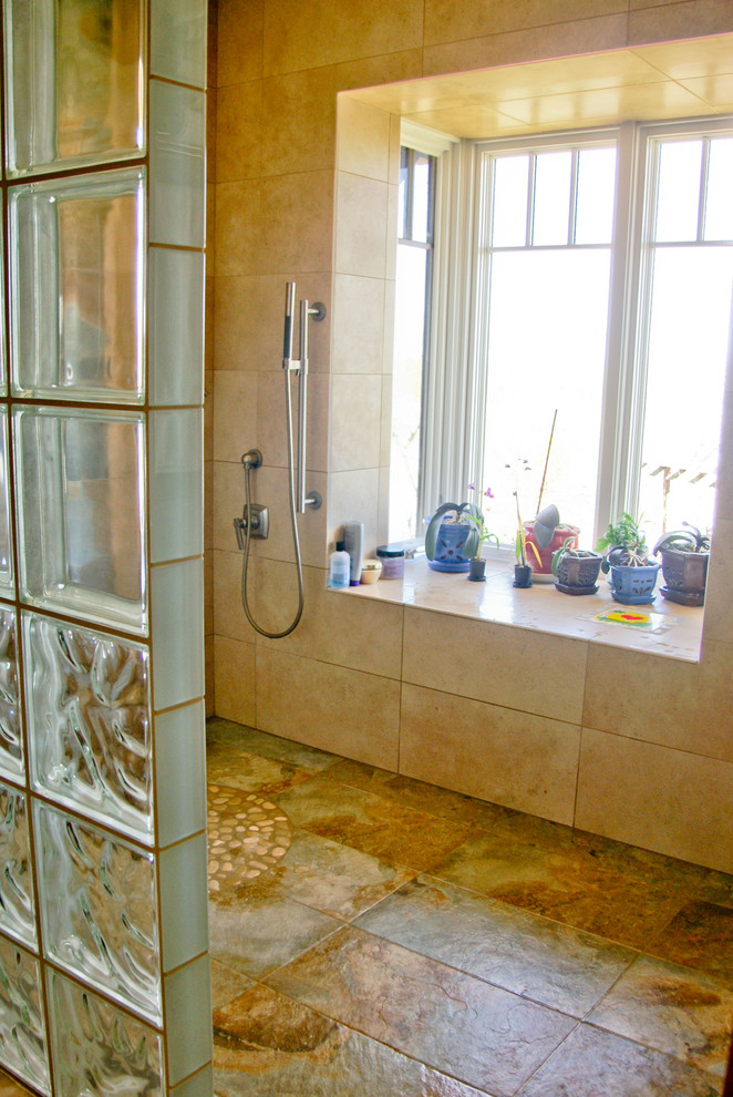 Inspiration for a small craftsman master beige tile and ceramic tile ceramic tile alcove shower remodel in Sacramento with an integrated sink, flat-panel cabinets, medium tone wood cabinets, solid surface countertops, a one-piece toilet and white walls