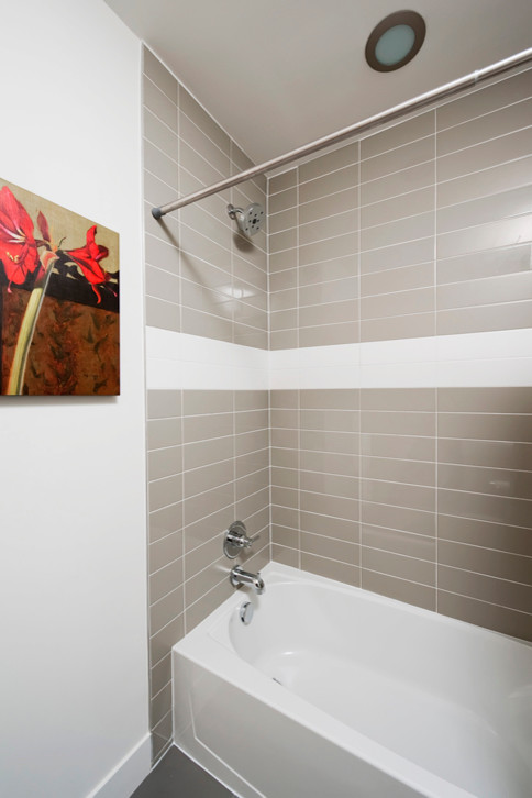 Example of a small urban white tile and ceramic tile ceramic tile freestanding bathtub design in Denver with a drop-in sink, concrete countertops and white walls