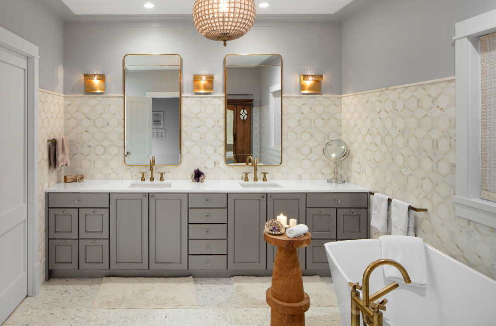 Inspiration for a coastal master multicolored tile multicolored floor and double-sink freestanding bathtub remodel in Chicago with shaker cabinets, gray cabinets, gray walls, an undermount sink, white countertops and a built-in vanity