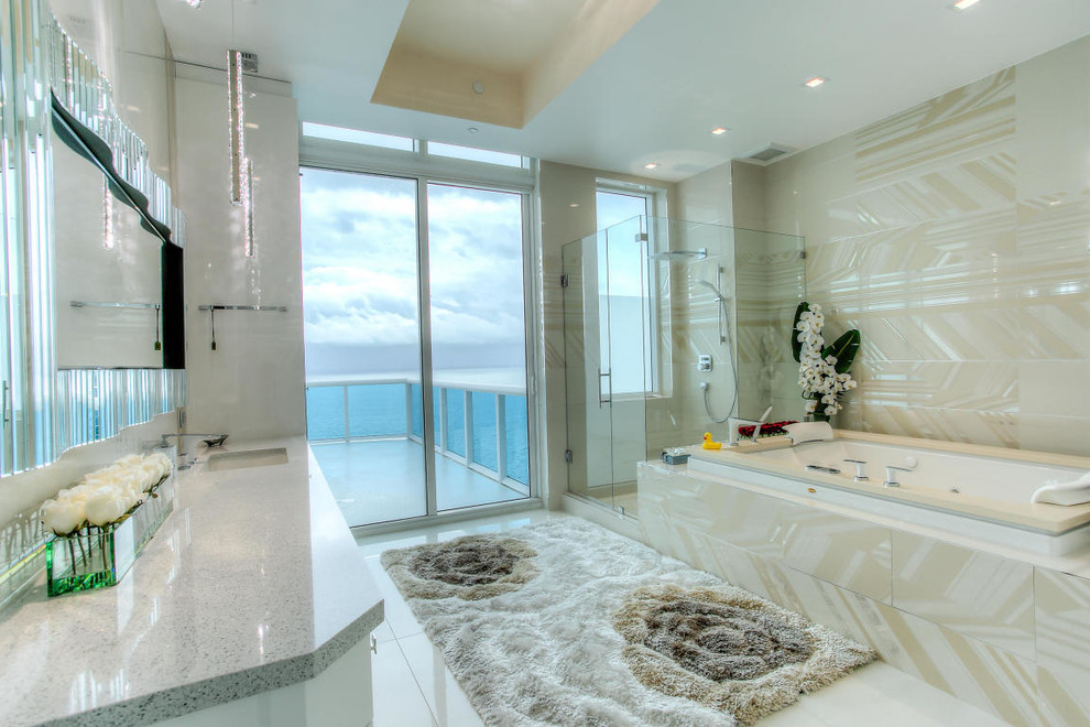 Bathroom - huge contemporary master beige tile, multicolored tile and porcelain tile porcelain tile bathroom idea in Miami with flat-panel cabinets, white cabinets, a two-piece toilet, beige walls, an undermount sink and quartz countertops