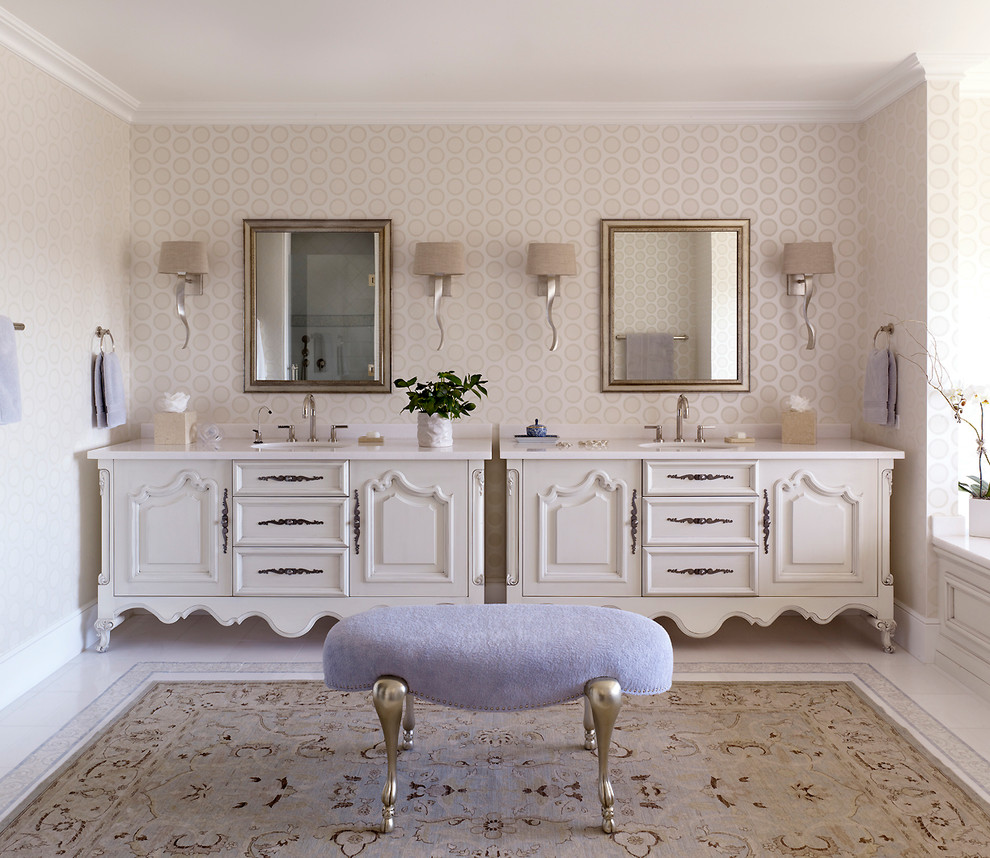 На фото: ванная комната в стиле неоклассика (современная классика) с врезной раковиной, фасадами с выступающей филенкой и бежевыми фасадами с