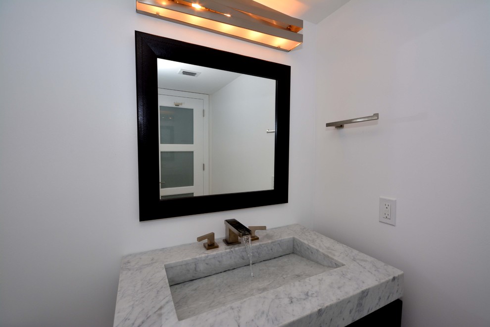 Photo of a small contemporary shower room bathroom in Miami with shaker cabinets, beige cabinets, a trough sink and marble worktops.