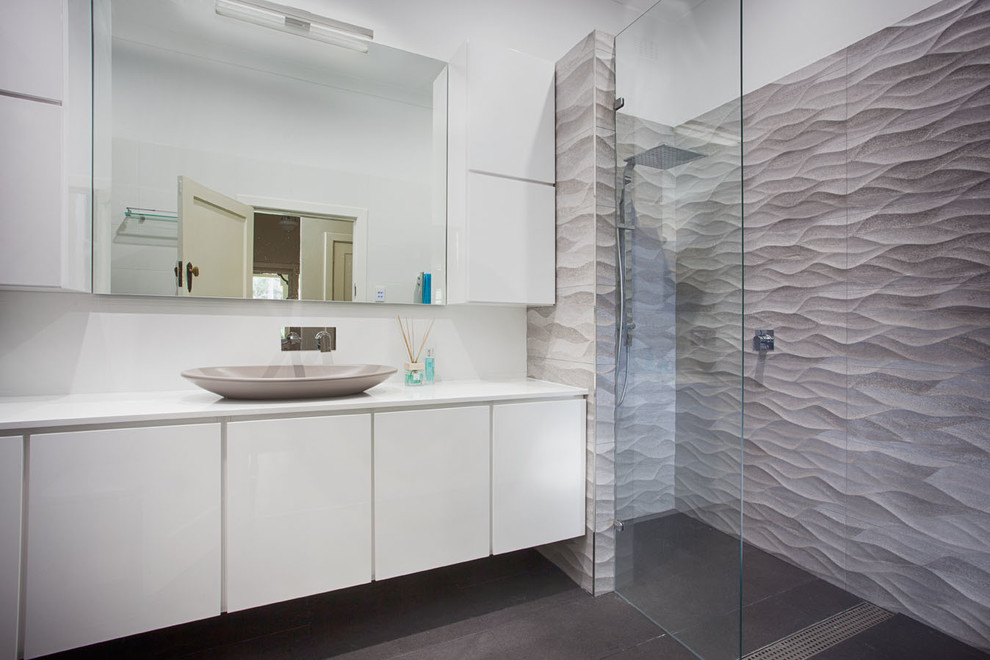 Design ideas for a medium sized modern bathroom in Perth with white cabinets, a walk-in shower, grey tiles, porcelain tiles, white walls and ceramic flooring.