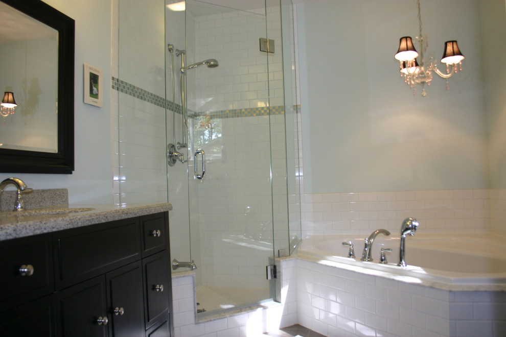 Example of a classic white tile bathroom design in Toronto