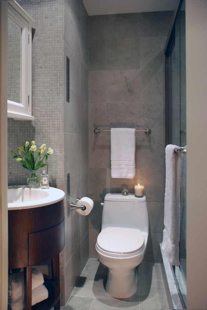 Inspiration for a transitional mosaic tile bathroom remodel in New York with a console sink