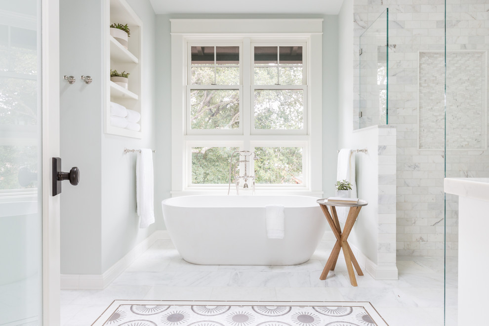 Photo of a medium sized traditional bathroom in San Francisco with shaker cabinets, white cabinets, a japanese bath, a built-in shower, a two-piece toilet, white tiles, stone tiles, blue walls, marble flooring, a submerged sink and engineered stone worktops.