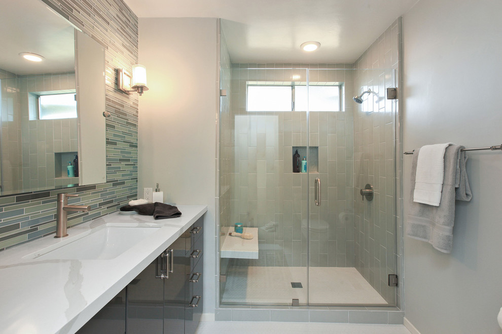 Mid-sized minimalist multicolored tile and matchstick tile porcelain tile bathroom photo in San Francisco with an undermount sink, flat-panel cabinets, gray cabinets, quartz countertops and gray walls