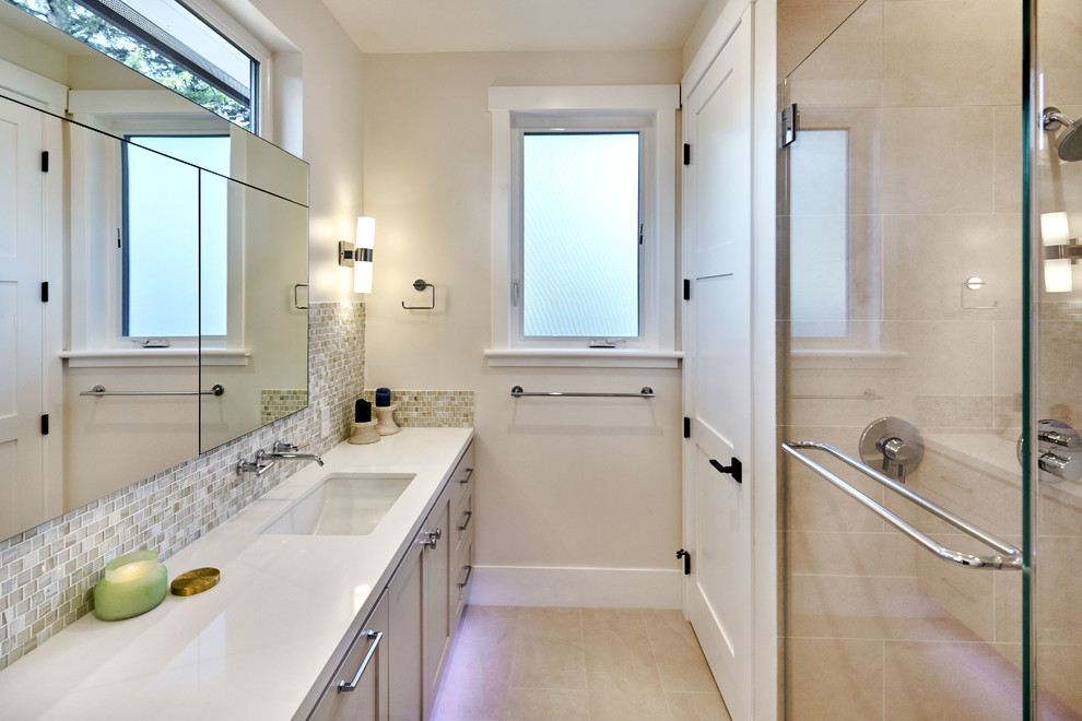 Design ideas for a large traditional ensuite bathroom in San Francisco with shaker cabinets, beige cabinets, beige tiles, white tiles, mosaic tiles, beige walls, a submerged sink, engineered stone worktops, beige floors and beige worktops.