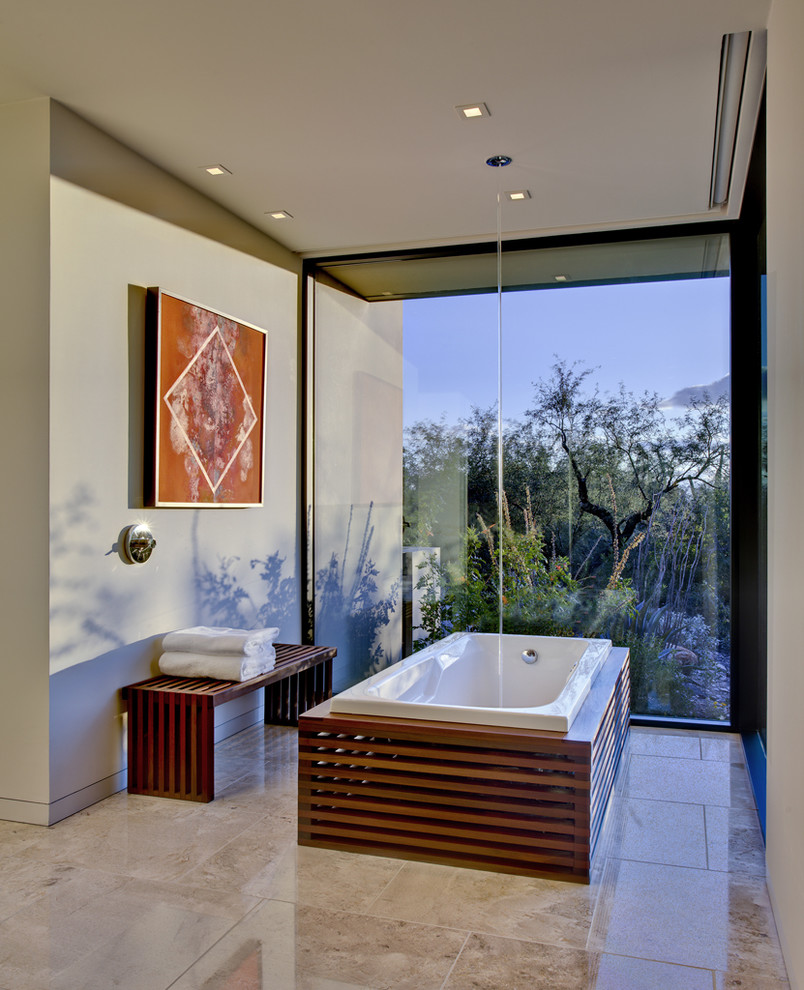 Imagen de cuarto de baño rectangular actual con baldosas y/o azulejos de piedra