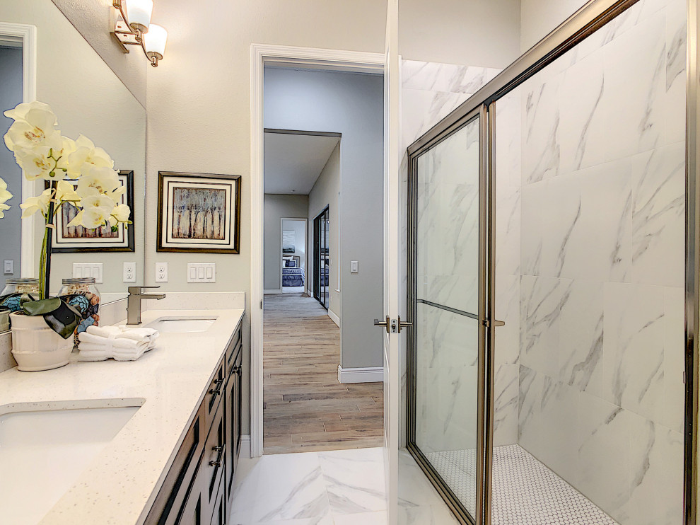 Large minimalist kids' multicolored tile and porcelain tile porcelain tile, multicolored floor and double-sink bathroom photo in Orlando with shaker cabinets, dark wood cabinets, a two-piece toilet, gray walls, an undermount sink, quartz countertops, white countertops and a built-in vanity