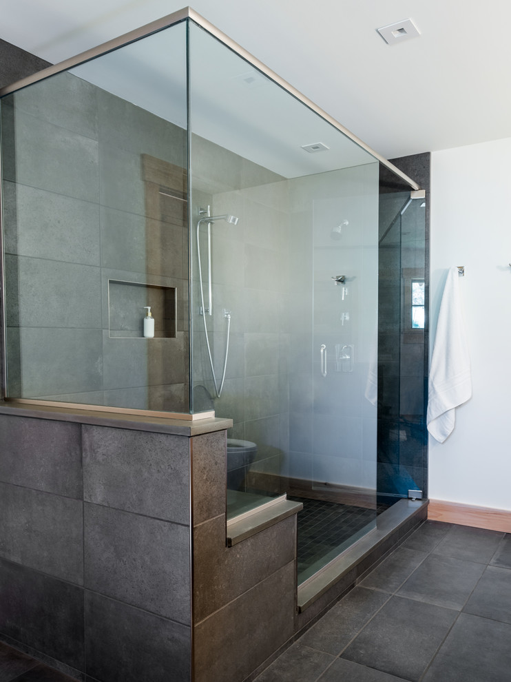 Large mountain style master gray tile and slate tile slate floor and gray floor doorless shower photo in Boston with shaker cabinets, light wood cabinets, white walls, an integrated sink, concrete countertops, a hinged shower door and gray countertops