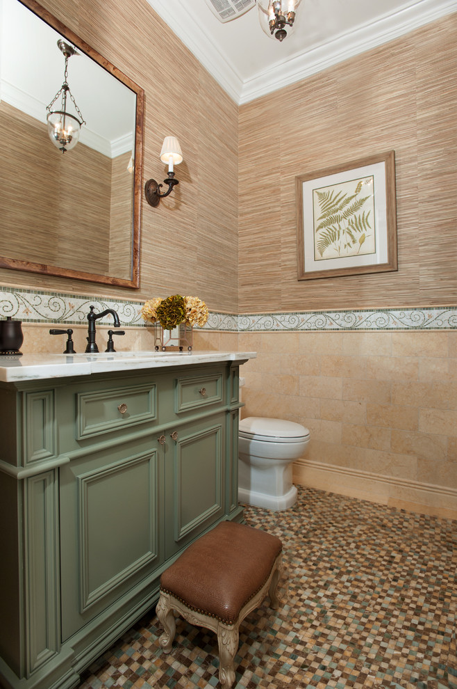 На фото: ванная комната в стиле неоклассика (современная классика) с бежевой плиткой, коричневой плиткой, зеленой плиткой, разноцветной плиткой, коричневыми стенами, врезной раковиной, мраморной столешницей и зелеными фасадами